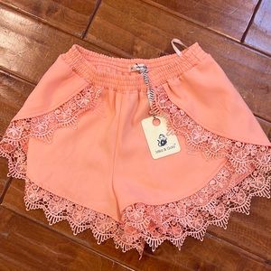 coral flowy shorts